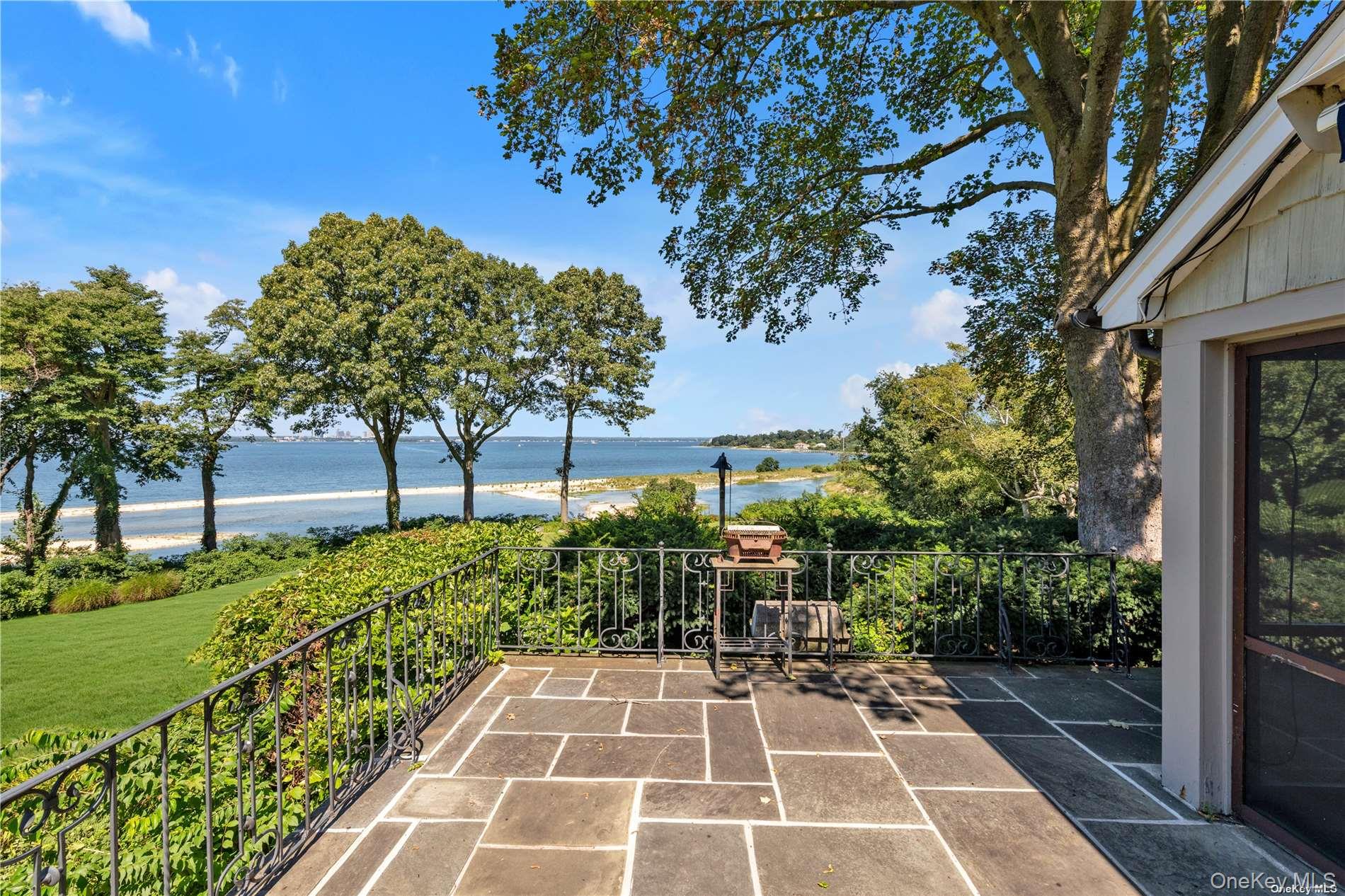 120 West Creek Farms Road Sands Point, NY 11050 - Photo 27 of 36 a view of a yard with plants and trees