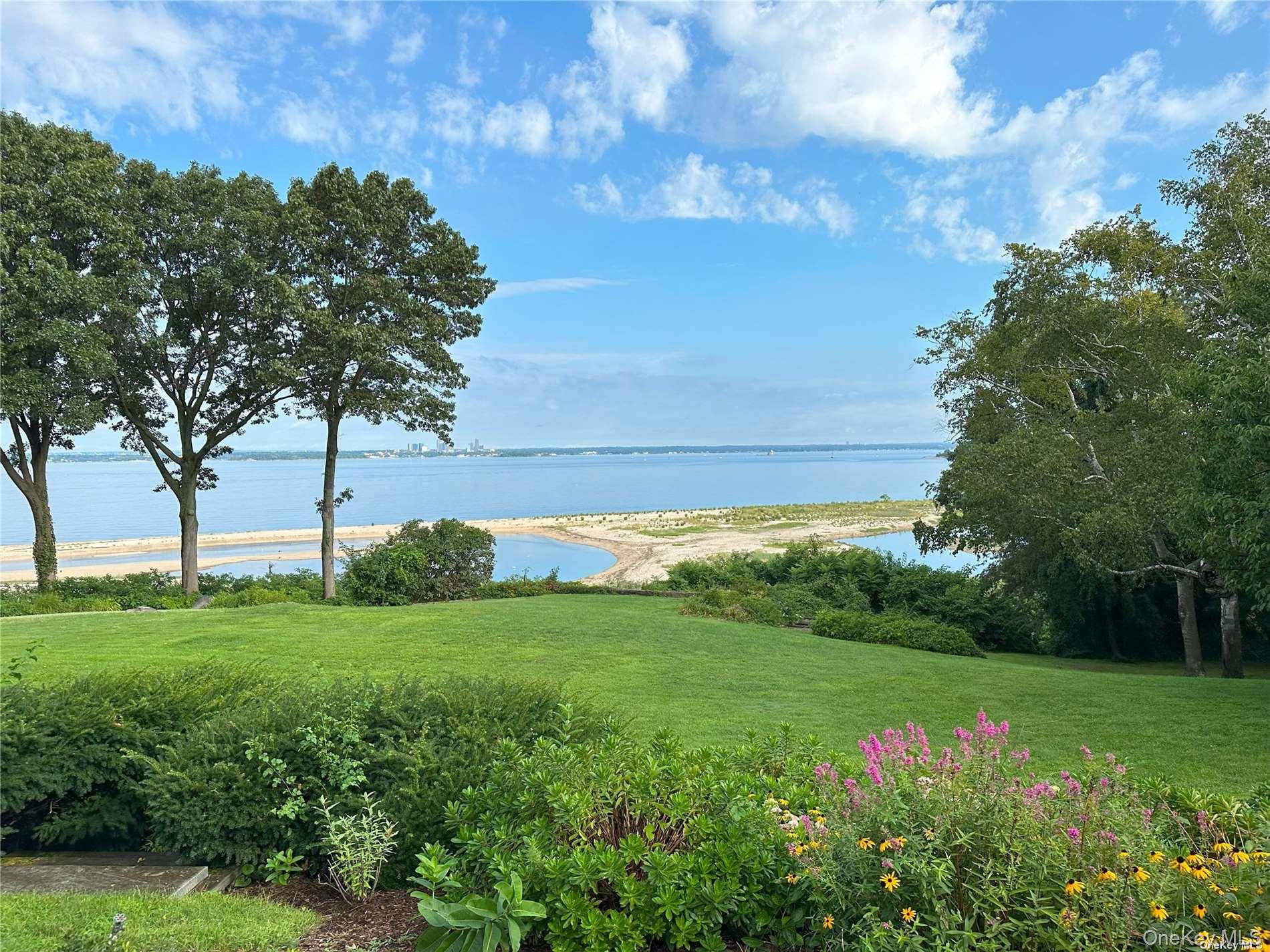 120 West Creek Farms Road Sands Point, NY 11050 - Photo 31 of 36 a view of a garden with plants and large trees