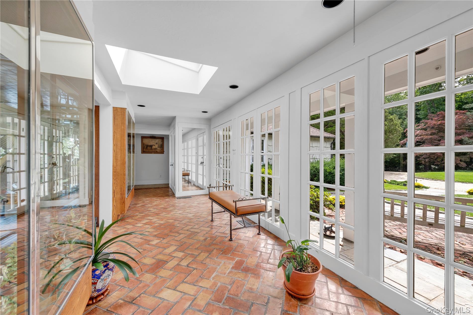 120 West Creek Farms Road Sands Point, NY 11050 - Photo 4 of 36 a lobby with furniture and floor to ceiling window
