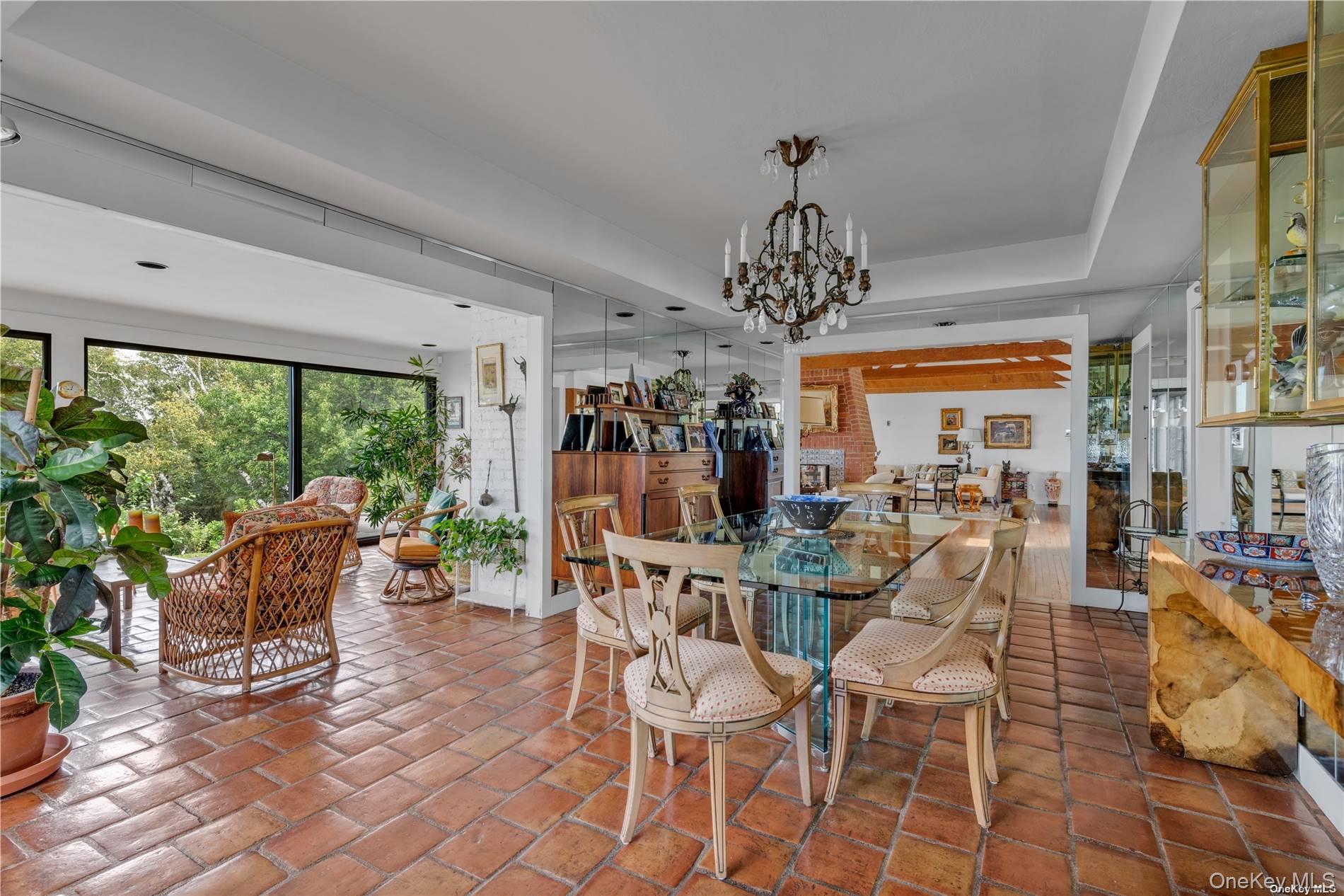 120 West Creek Farms Road Sands Point, NY 11050 - Photo 10 of 36 a view of a dining room with furniture window and outside view