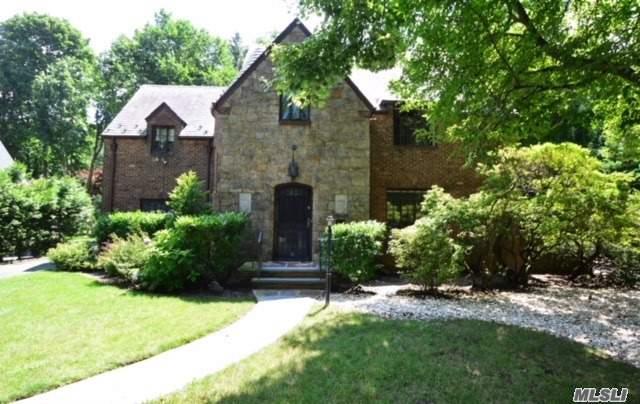 20 Linford Road Great Neck, NY 11021 - Photo 1 of 1 a front view of house with a garden