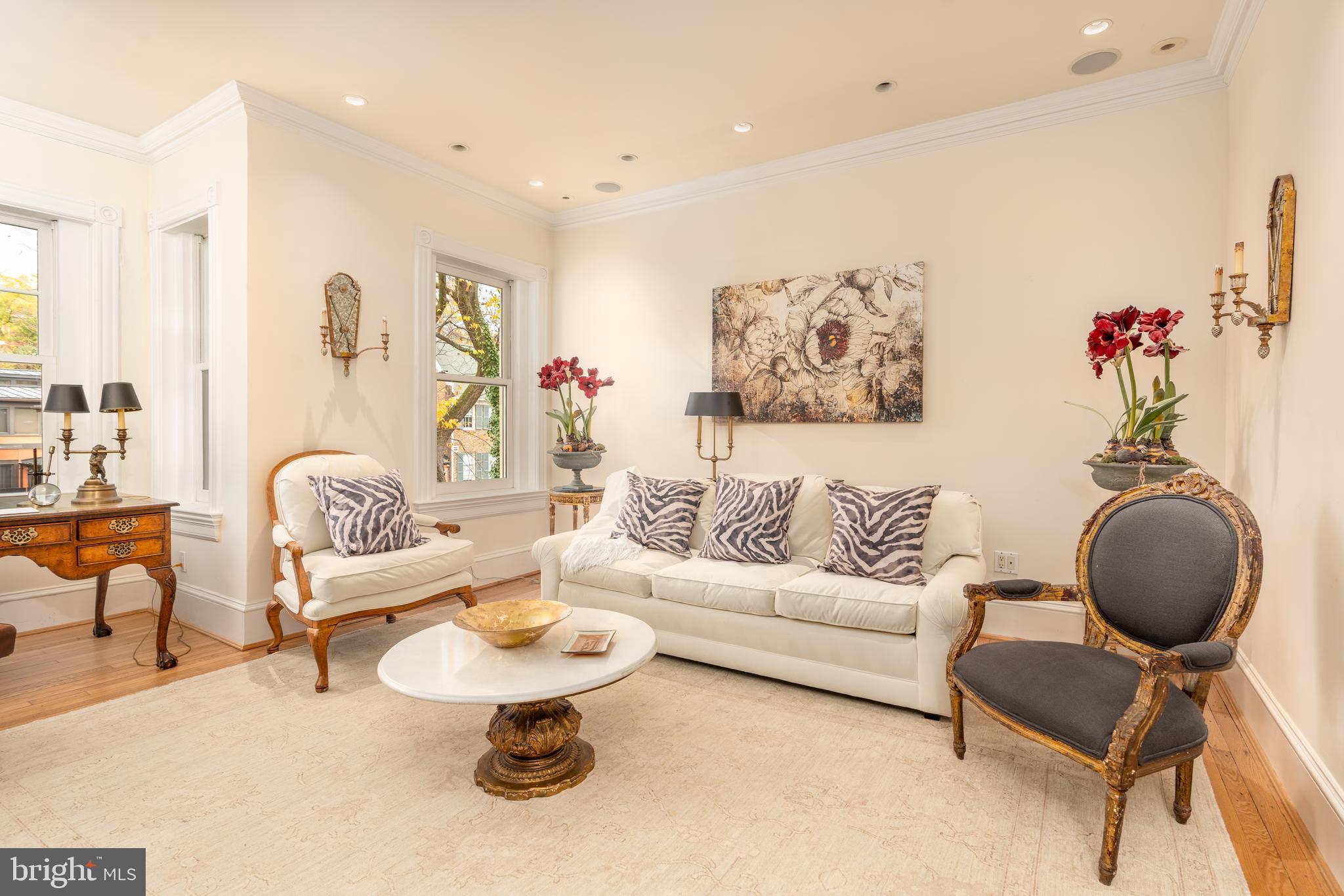 3070 Q Street Northwest Washington, DC 20007 - Photo 25 of 33 a living room with furniture and a chandelier