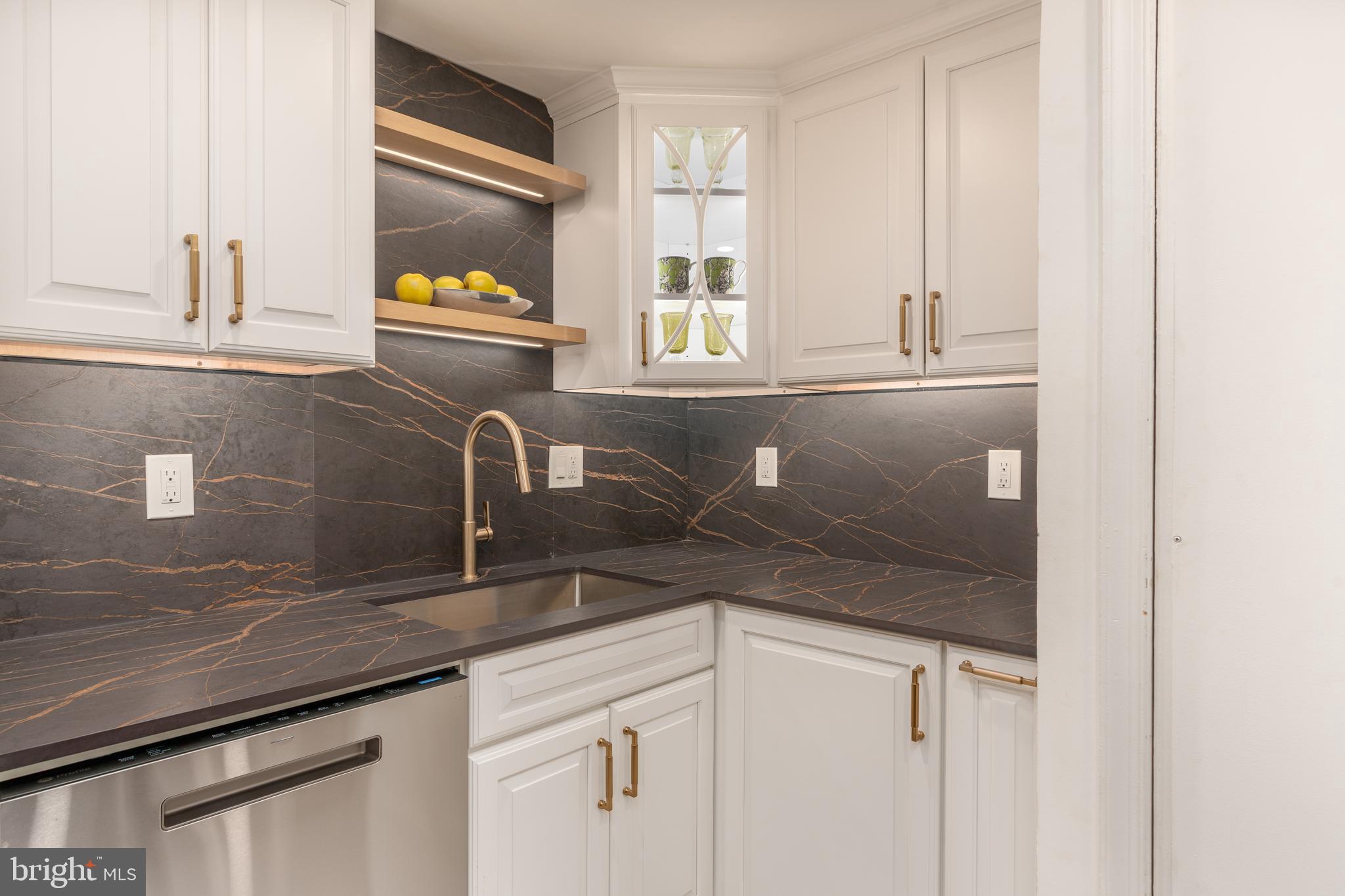 3070 Q Street Northwest Washington, DC 20007 - Photo 29 of 33 a close view of sink and tap