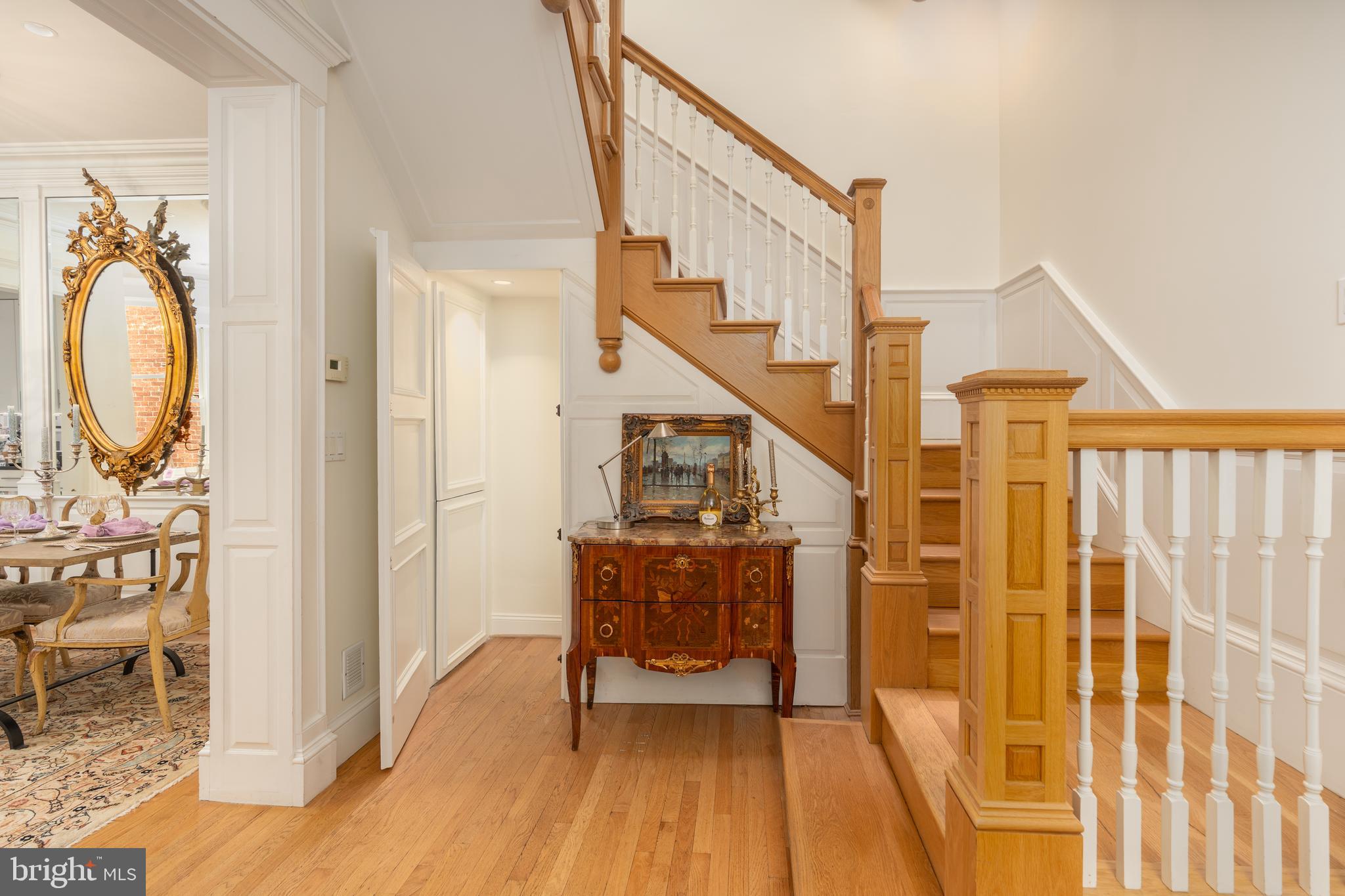 3070 Q Street Northwest Washington, DC 20007 - Photo 7 of 33 a view of an entryway with wooden floor and livingroom