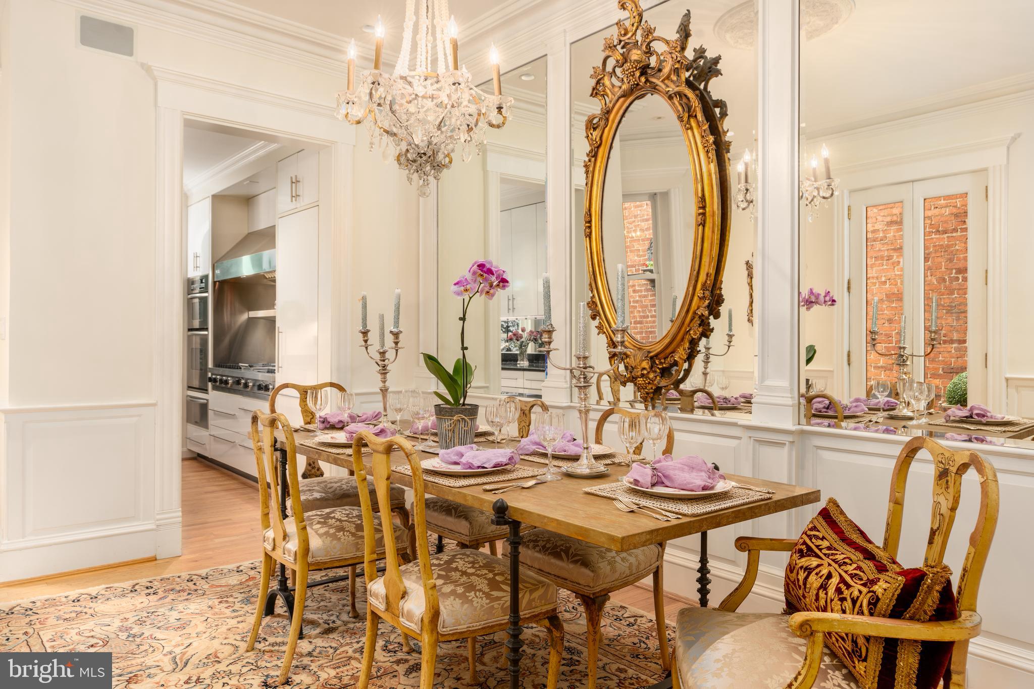 3070 Q Street Northwest Washington, DC 20007 - Photo 9 of 33 a view of a dining room with furniture and a chandelier