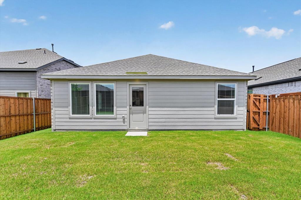 1516 Prince Road Howe, TX 75459 - Photo 26 of 28 a view of a house with a yard and a garden