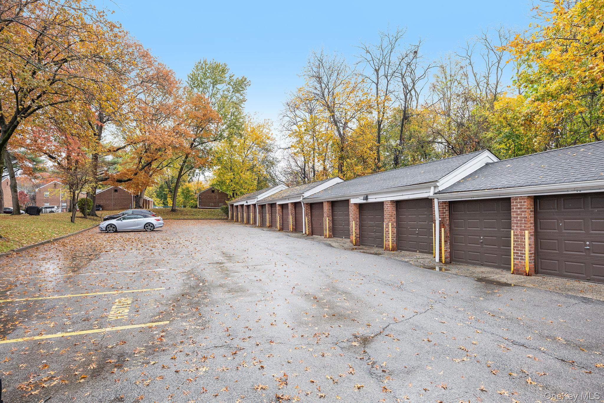 470 Tuckahoe Road, Unit 2A Yonkers, NY 10710 - Photo 11 of 12 a view of a house with a yard and tree s