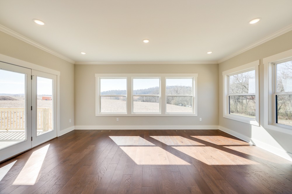 575 Flippen Road Lebanon, TN 37087 - Photo 13 of 14 a view of an empty room with wooden floor and a window