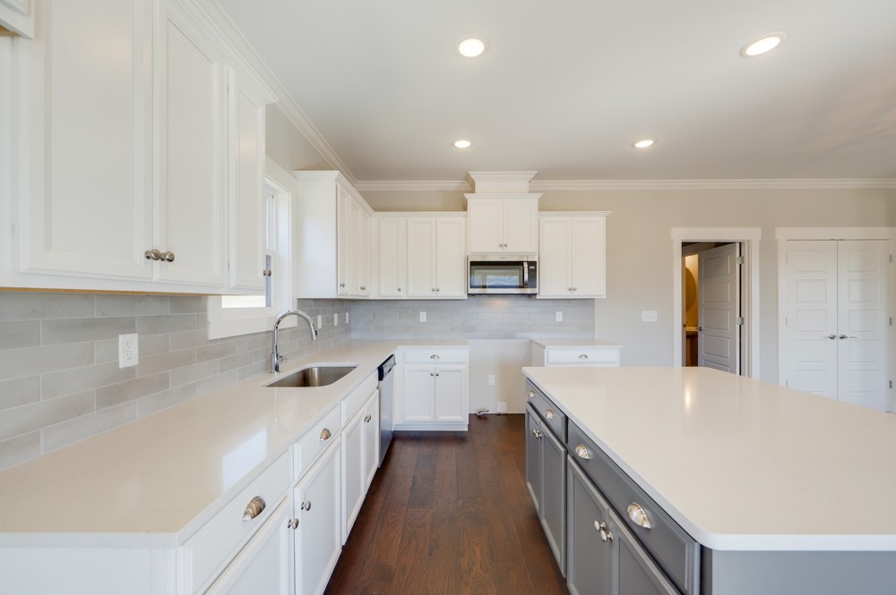 575 Flippen Road Lebanon, TN 37087 - Photo 7 of 14 a large white kitchen with stainless steel appliances