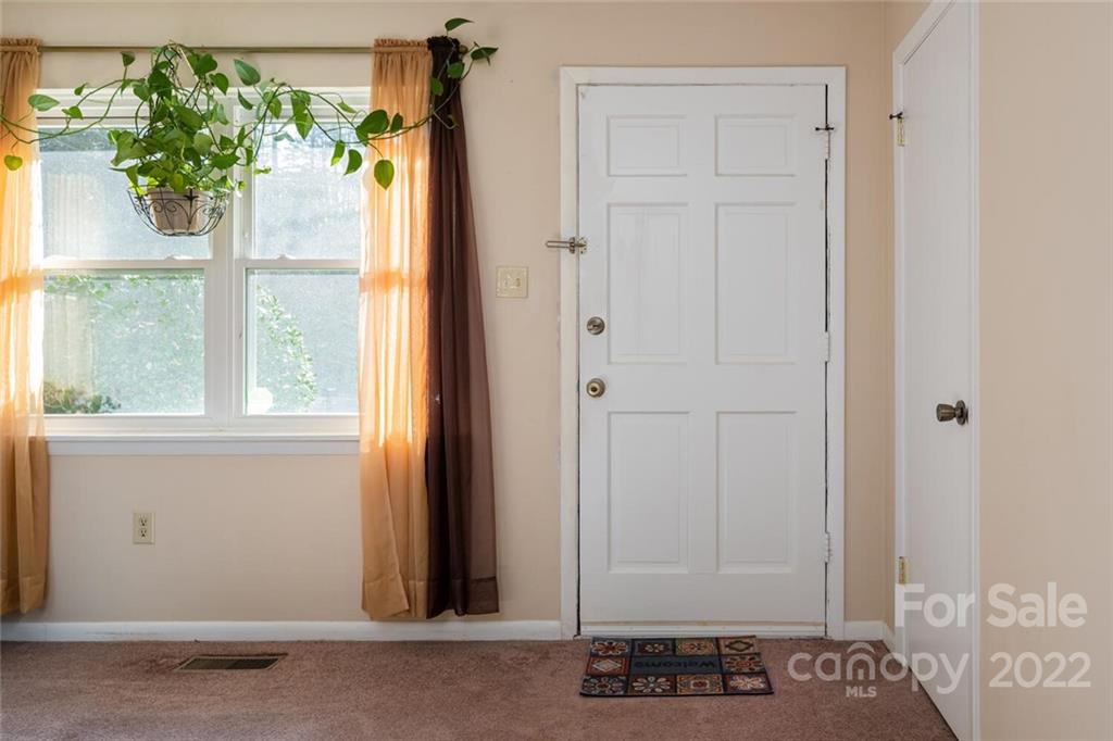 2 Eastcrest Drive Fairview, NC 28730 - Photo 4 of 32 a view of a front door of house