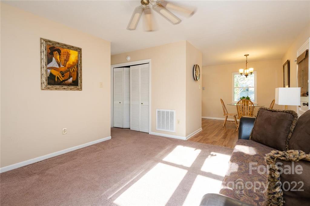 2 Eastcrest Drive Fairview, NC 28730 - Photo 6 of 32 a view of a livingroom with furniture and a window