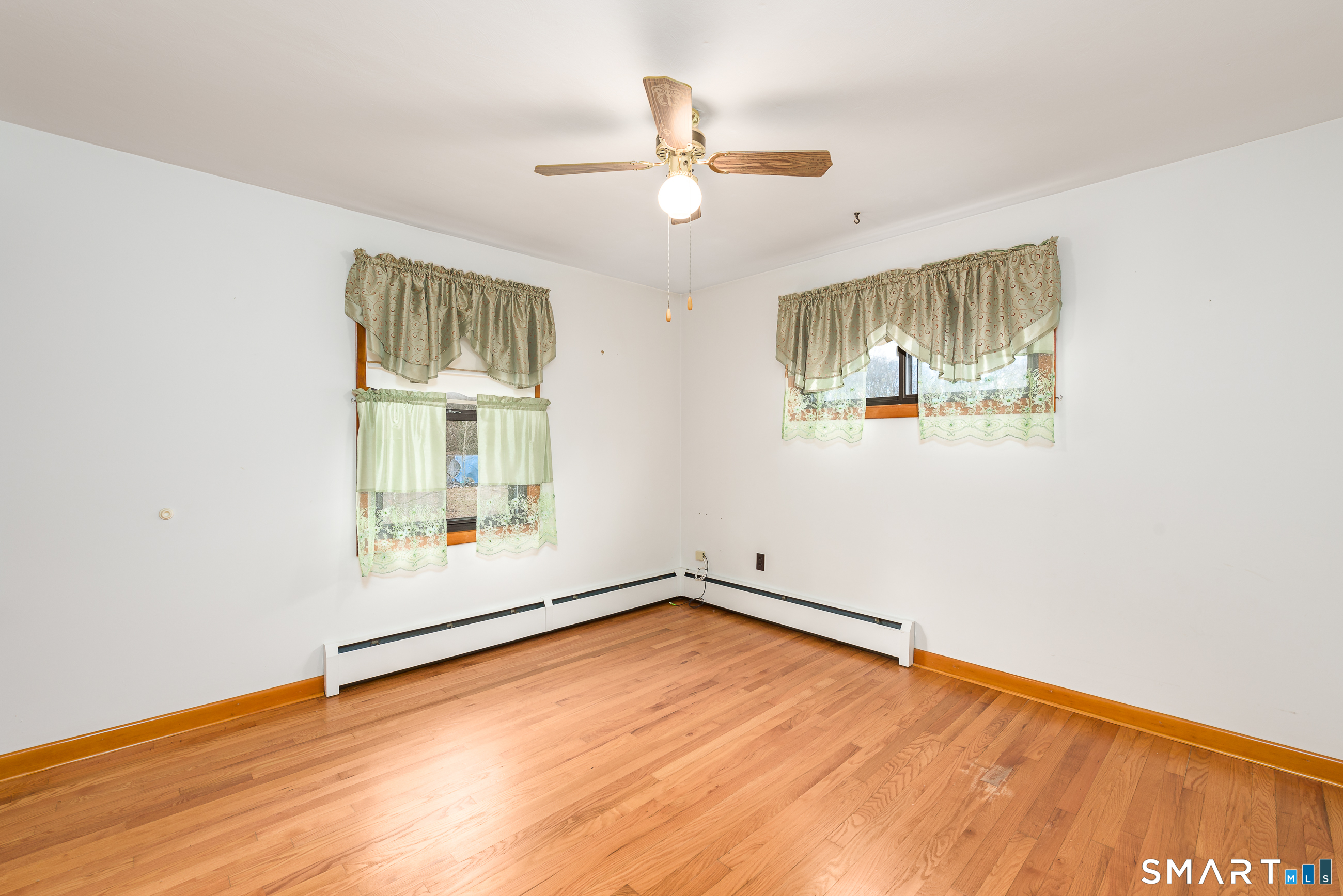 6 Saunders Lane Prospect, CT 06712 - Photo 13 of 25 wooden floor in an empty room with a window