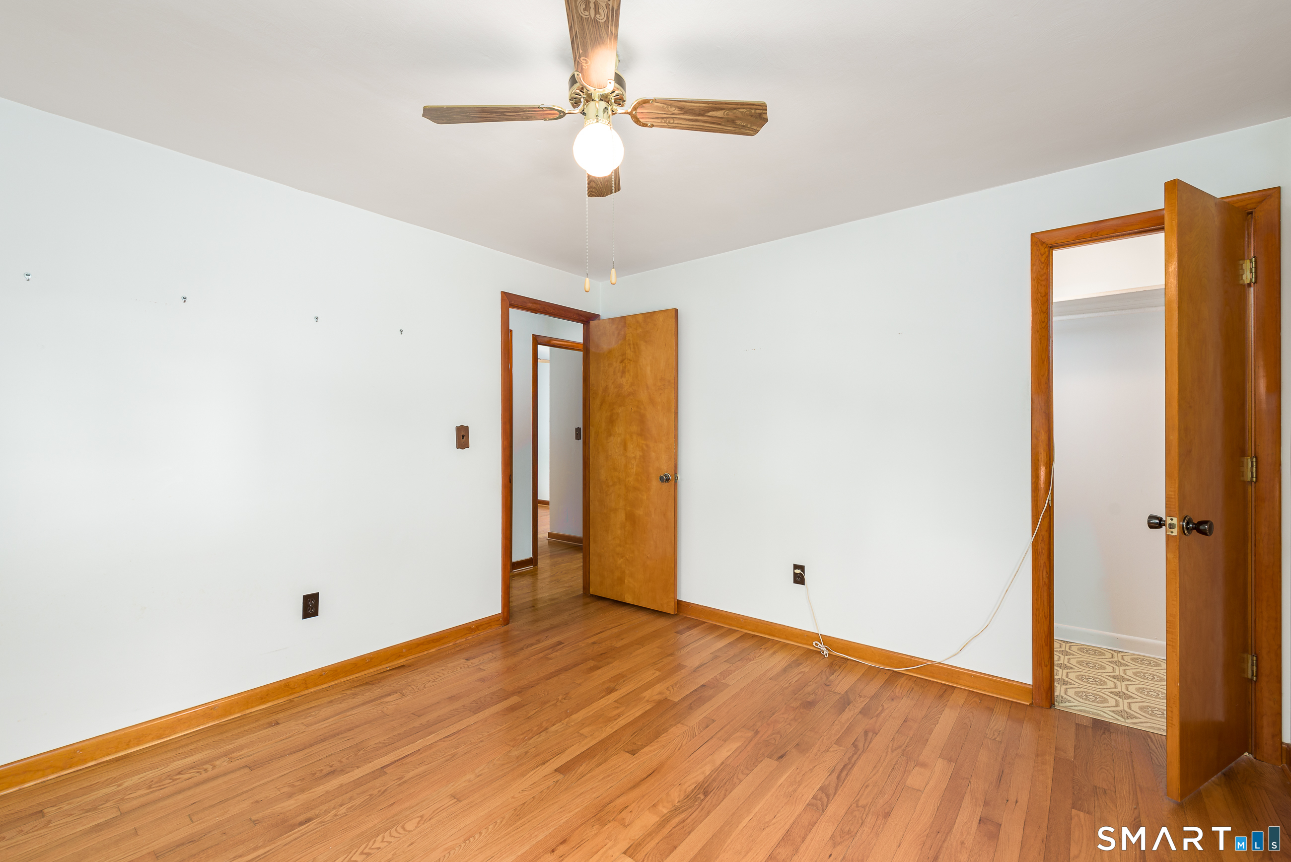 6 Saunders Lane Prospect, CT 06712 - Photo 15 of 25 a view of an empty room with wooden floor
