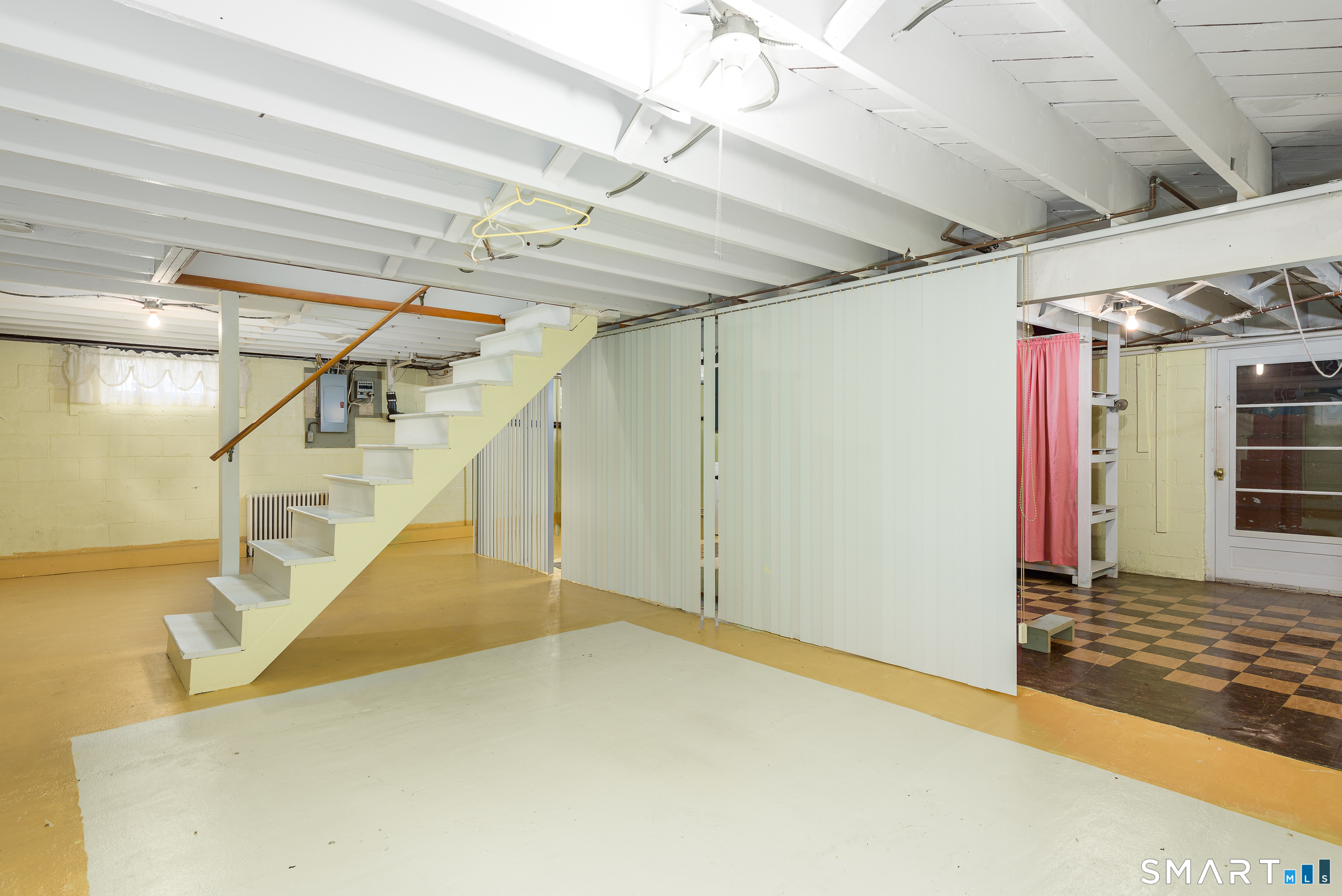 6 Saunders Lane Prospect, CT 06712 - Photo 20 of 25 a view of a hallway with a white walls and stairs