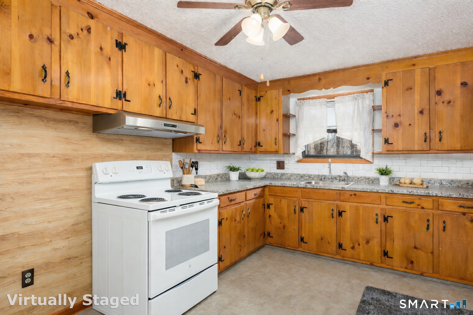 6 Saunders Lane Prospect, CT 06712 - Photo 8 of 25 a kitchen with stainless steel appliances granite countertop a stove and a sink