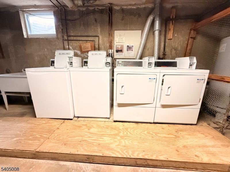 12 Rustic Circle Montvale, NJ 07645 - Photo 12 of 13 a utility room with dryer and washer