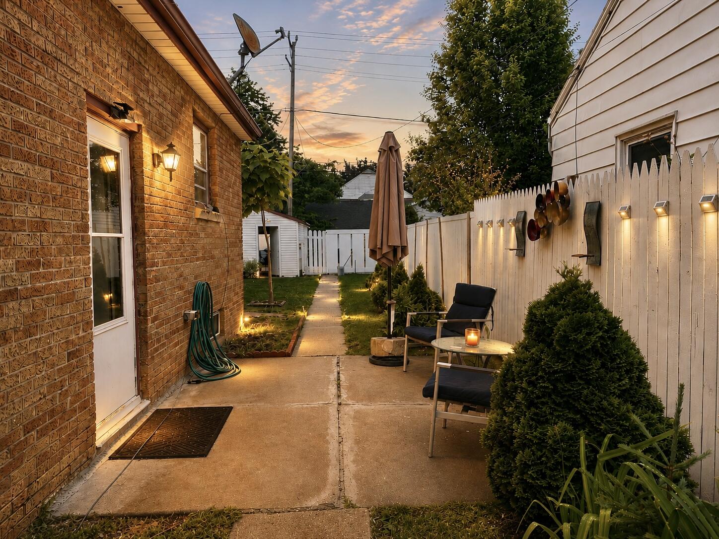 214 South 65th Street Milwaukee, WI 53214 - Photo 6 of 29 Side patio perfect for enjoying summer! Some photos may include virtually staging and or digital enhancements.