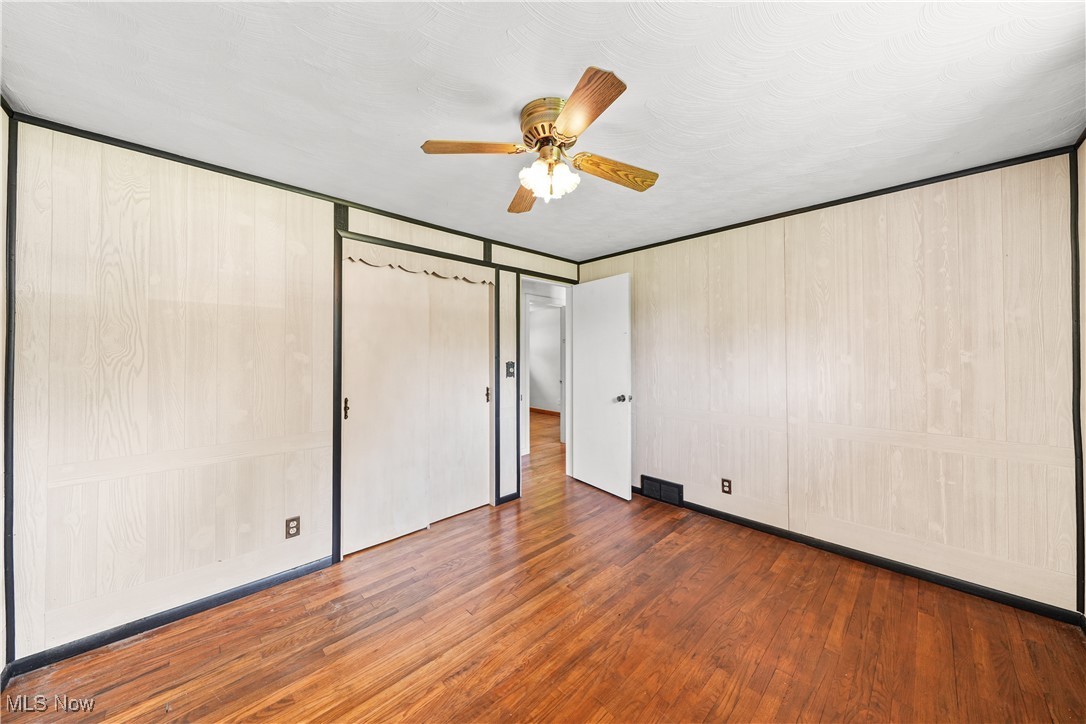 11828 Sheldon Road Mantua, OH 44255 - Photo 15 of 31 Master bedroom with hardwood floors and ceiling fan