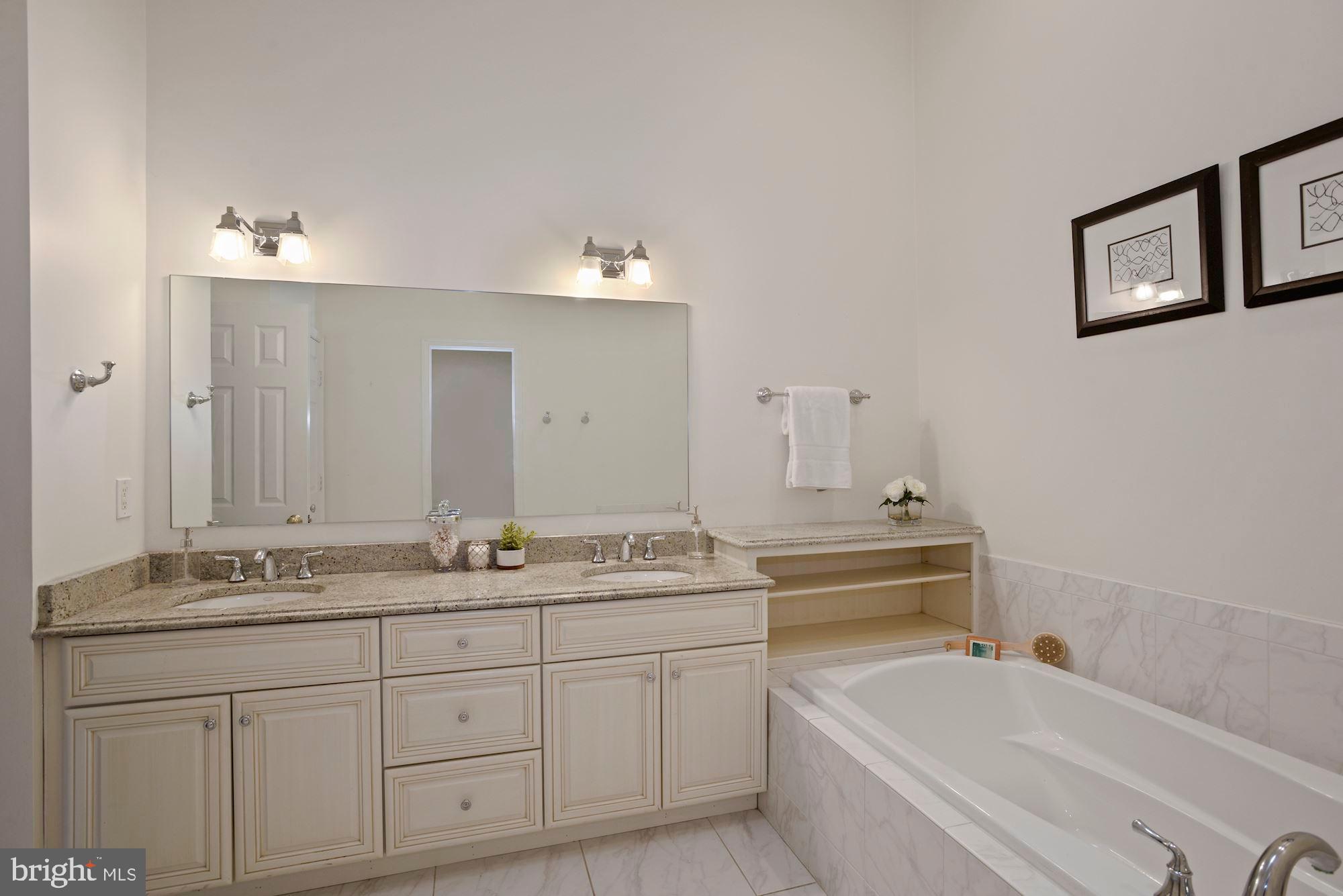 3644 Reservoir Road Northwest Washington, DC 20007 - Photo 17 of 27 Spacious master bathroom with tub and shower.