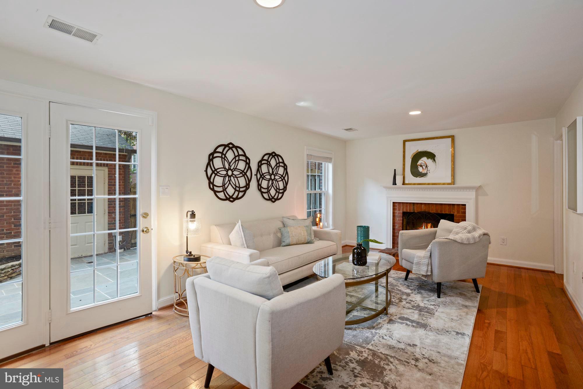 3644 Reservoir Road Northwest Washington, DC 20007 - Photo 23 of 27 Lower level family room with wood burning fireplac