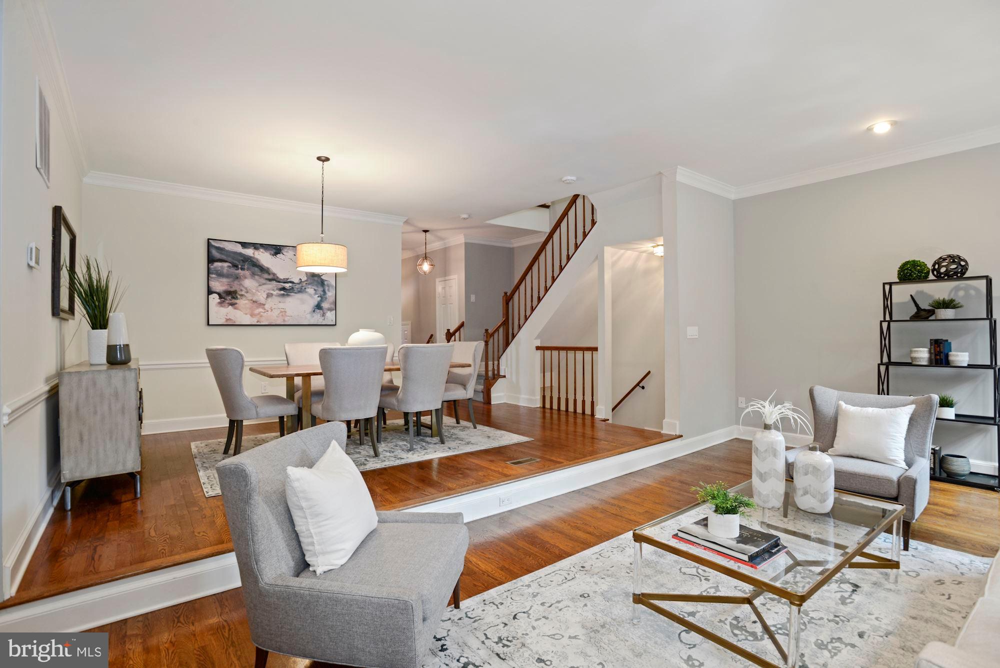 3644 Reservoir Road Northwest Washington, DC 20007 - Photo 10 of 27 Open space with hardwood floor.