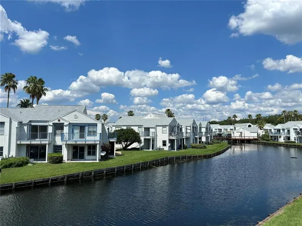 a view of a lake with a building in the background