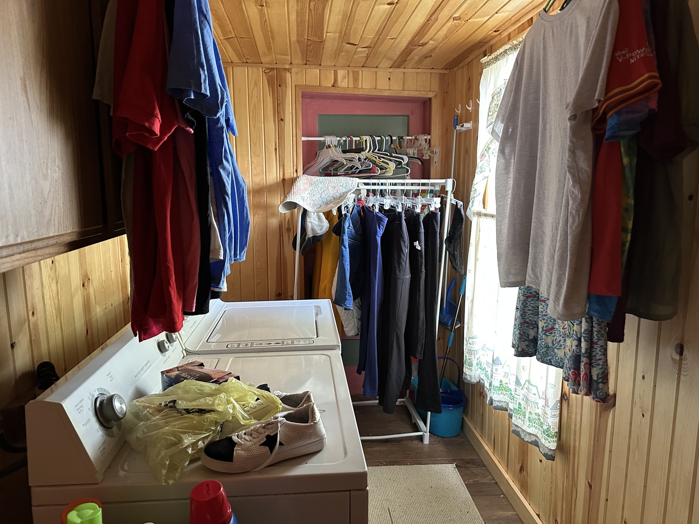 1470 Stone Road Albany, IL 61230 - Photo 12 of 16 a view of walk in closet with clothes and shoes