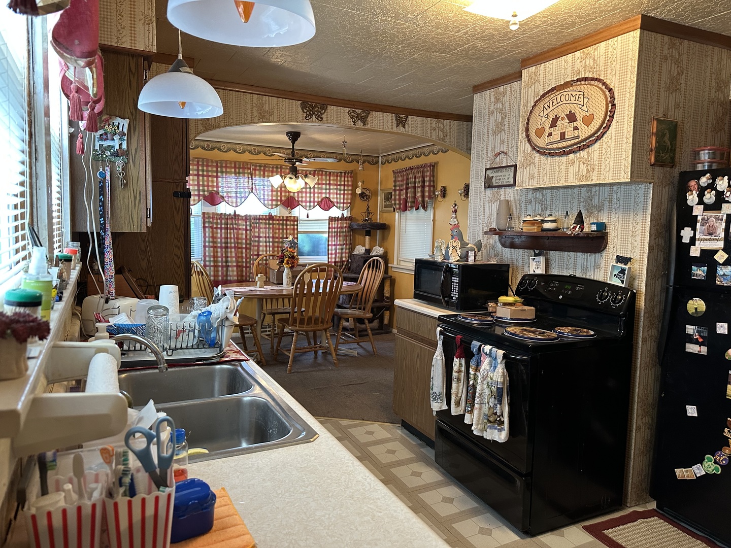 1470 Stone Road Albany, IL 61230 - Photo 3 of 16 a kitchen filled with furniture and a table