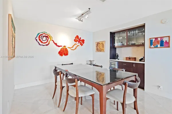 a table and a vase sitting on a table