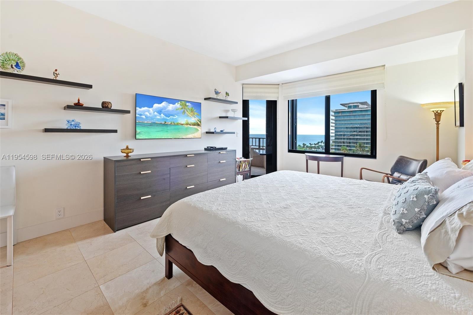 Key Biscayne Key Biscayne, FL 33149 - Photo 15 of 25 a bed room with a bed and a television