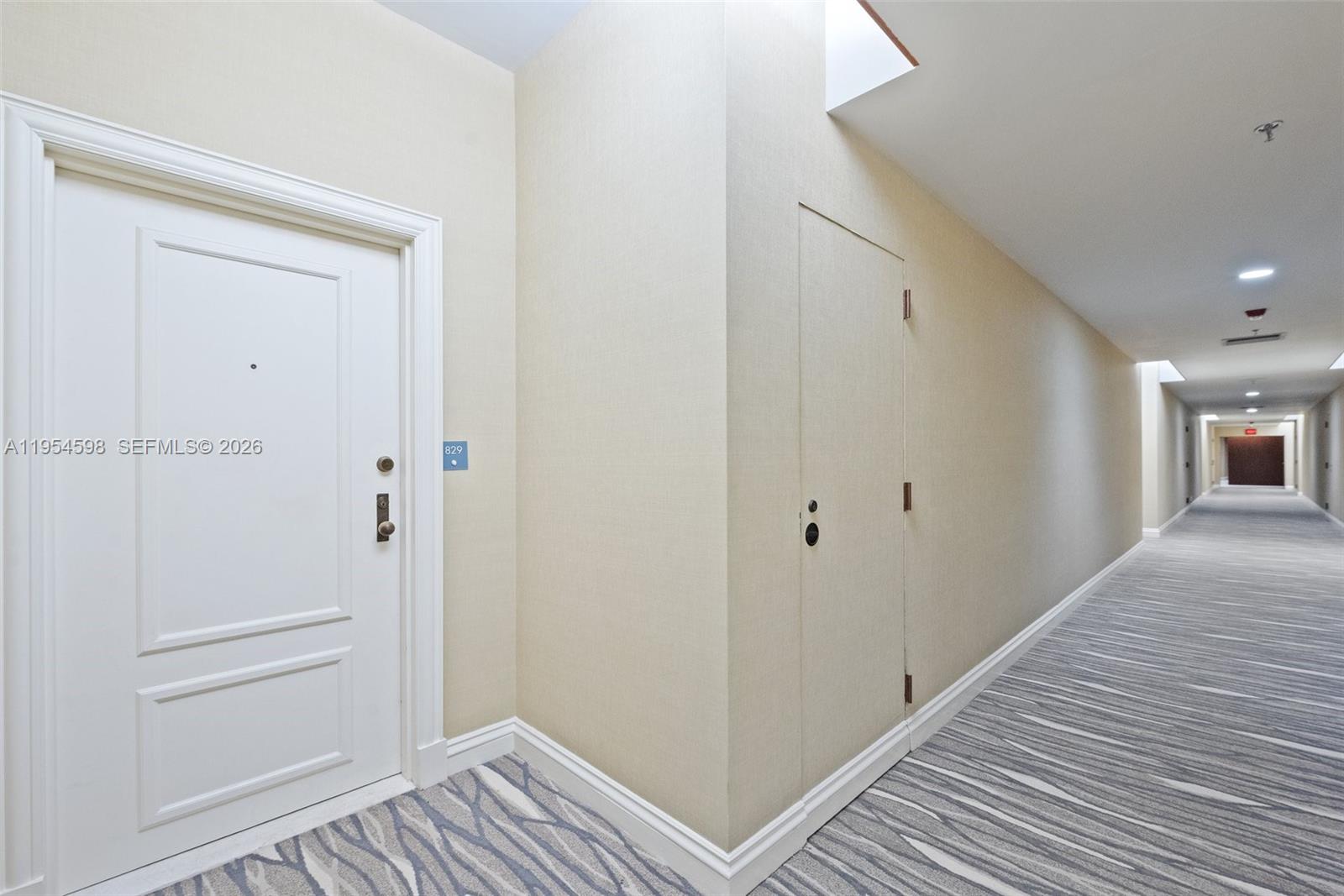 Key Biscayne Key Biscayne, FL 33149 - Photo 3 of 25 a view of a hallway with wooden floor