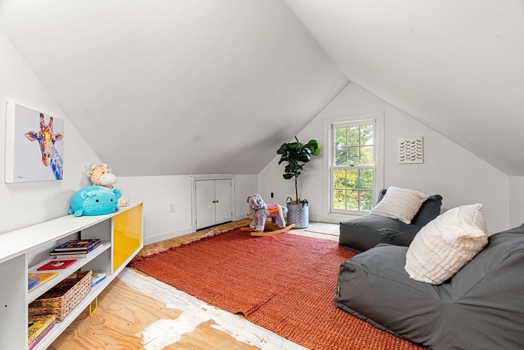 15 Harris Avenue Boston, MA 02130 - Photo 25 of 27 a bed room with a bed and a window