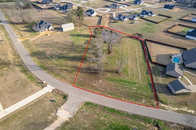 a view of swimming pool with a yard
