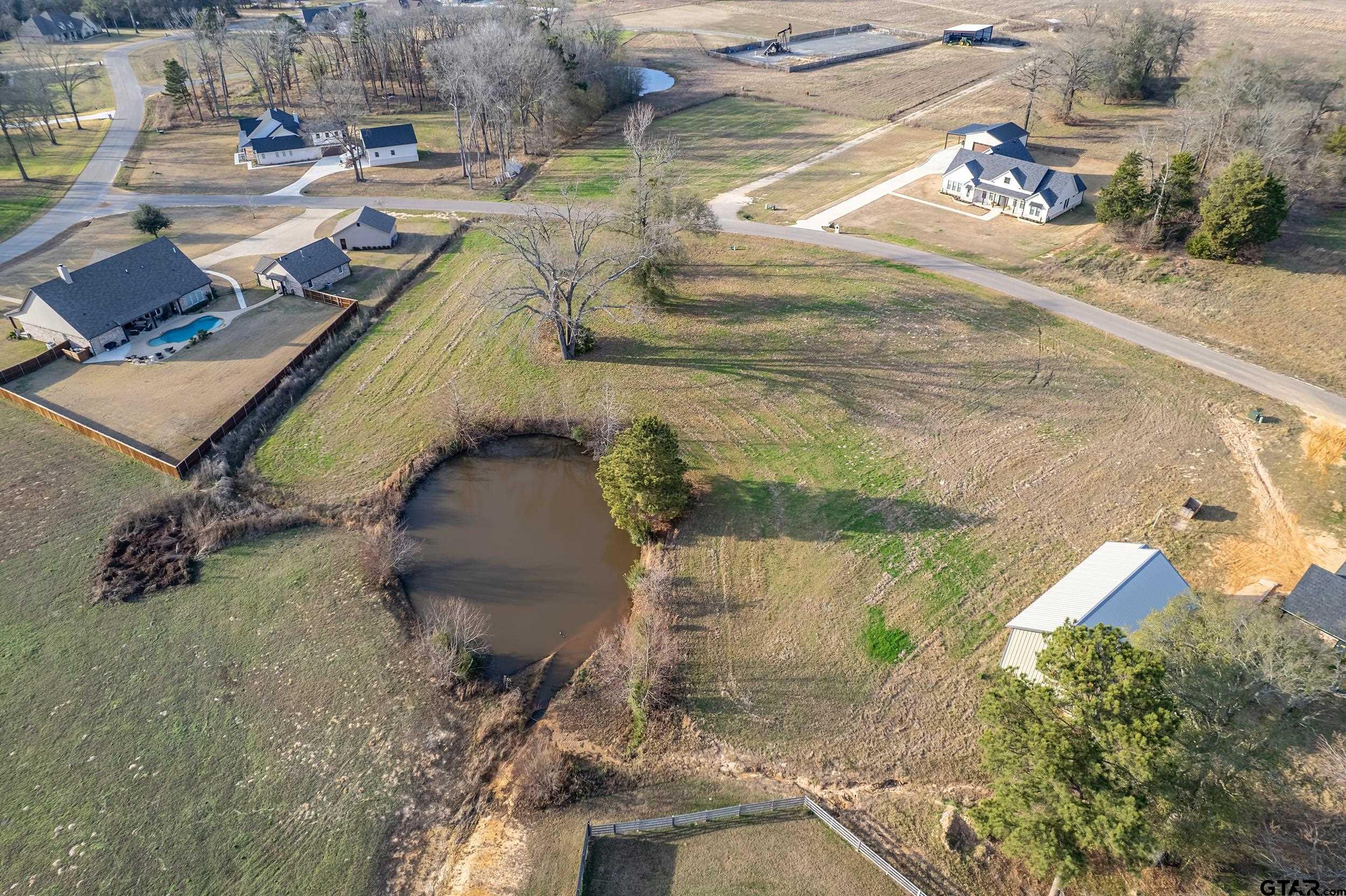 21357 Memory Lane Bullard, TX 75757 - Photo 3 of 7 a view of a backyard of a house
