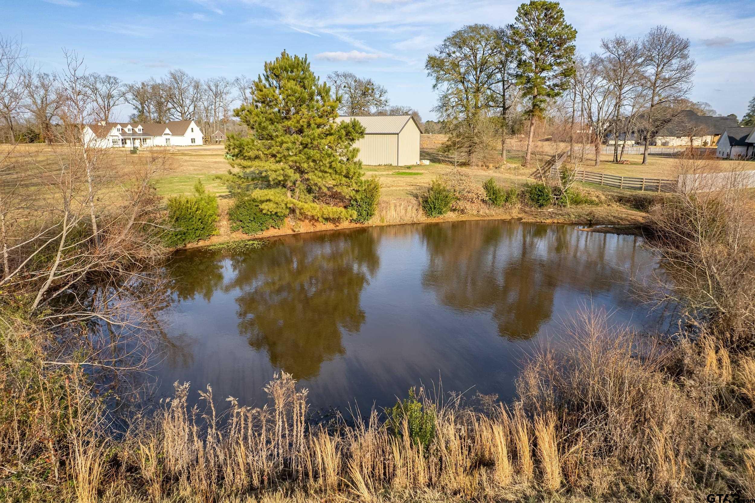 21357 Memory Lane Bullard, TX 75757 - Photo 6 of 7 a view of a lake with outdoor space