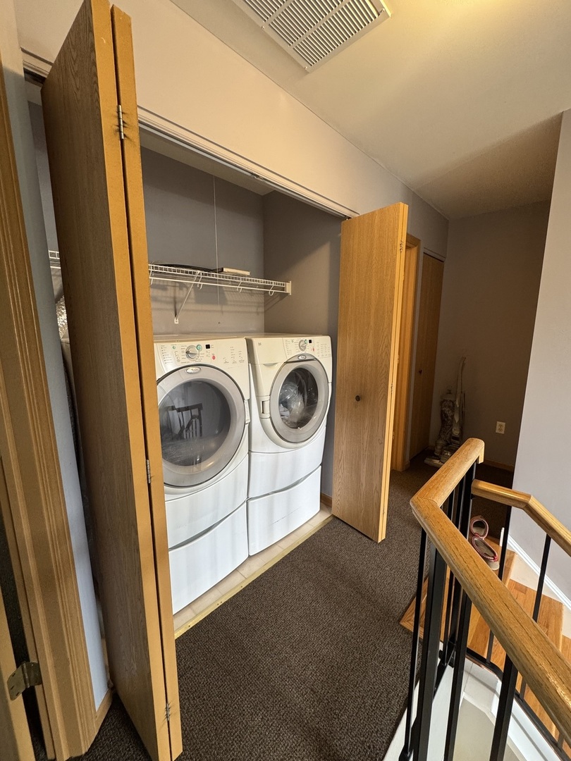 1716 William Drive Romeoville, IL 60446 - Photo 13 of 18 a utility room with dryer and washer