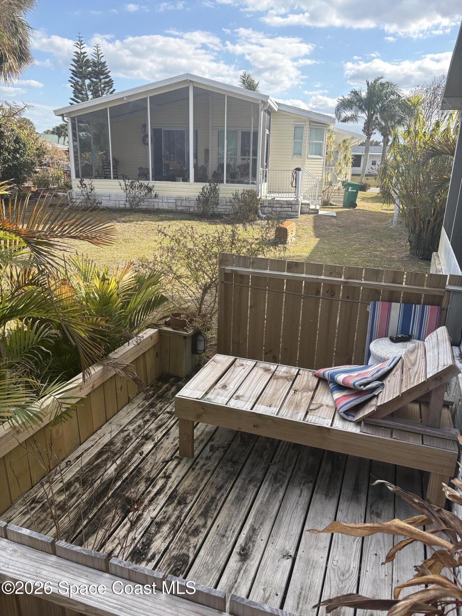 7625 Longhorn Avenue, Unit P3 Micco, FL 32976 - Photo 12 of 40 a view of swimming pool with outdoor seating