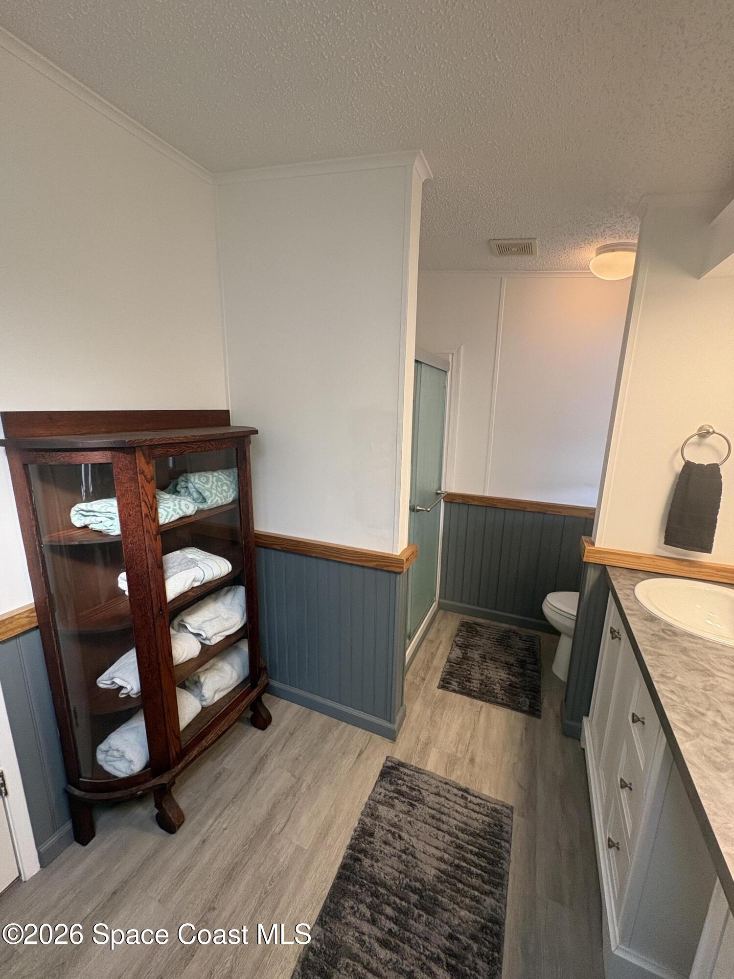 7625 Longhorn Avenue, Unit P3 Micco, FL 32976 - Photo 16 of 40 a view of an empty room and staircase