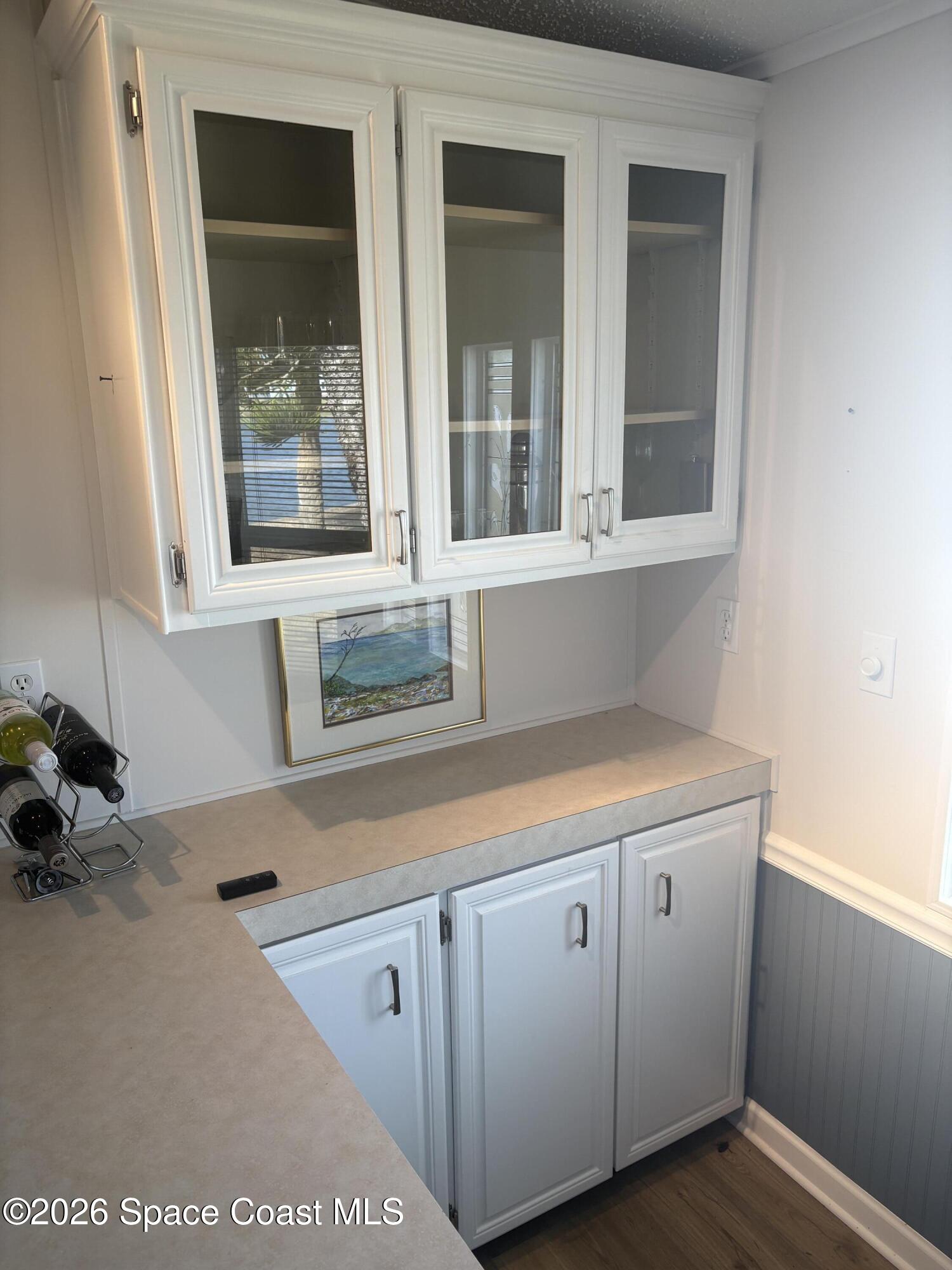 7625 Longhorn Avenue, Unit P3 Micco, FL 32976 - Photo 21 of 40 a kitchen with a sink and cabinets