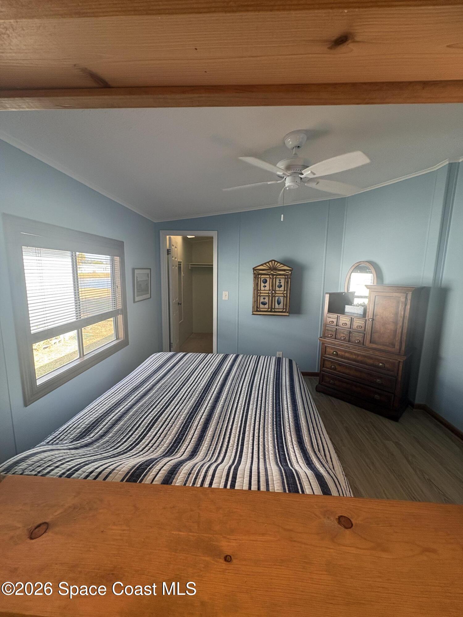 7625 Longhorn Avenue, Unit P3 Micco, FL 32976 - Photo 25 of 40 a view of an empty room and window