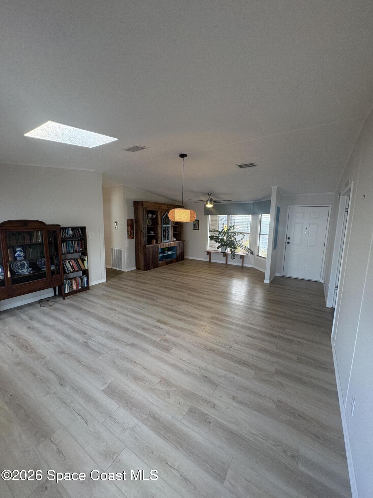 7625 Longhorn Avenue, Unit P3 Micco, FL 32976 - Photo 35 of 40 a view of a livingroom with furniture and a fireplace