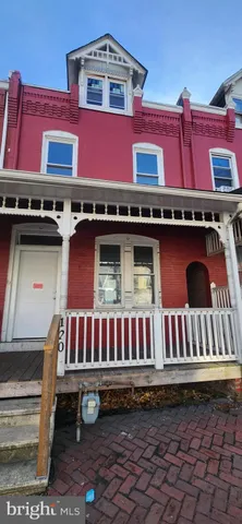 a front view of a building with balcony