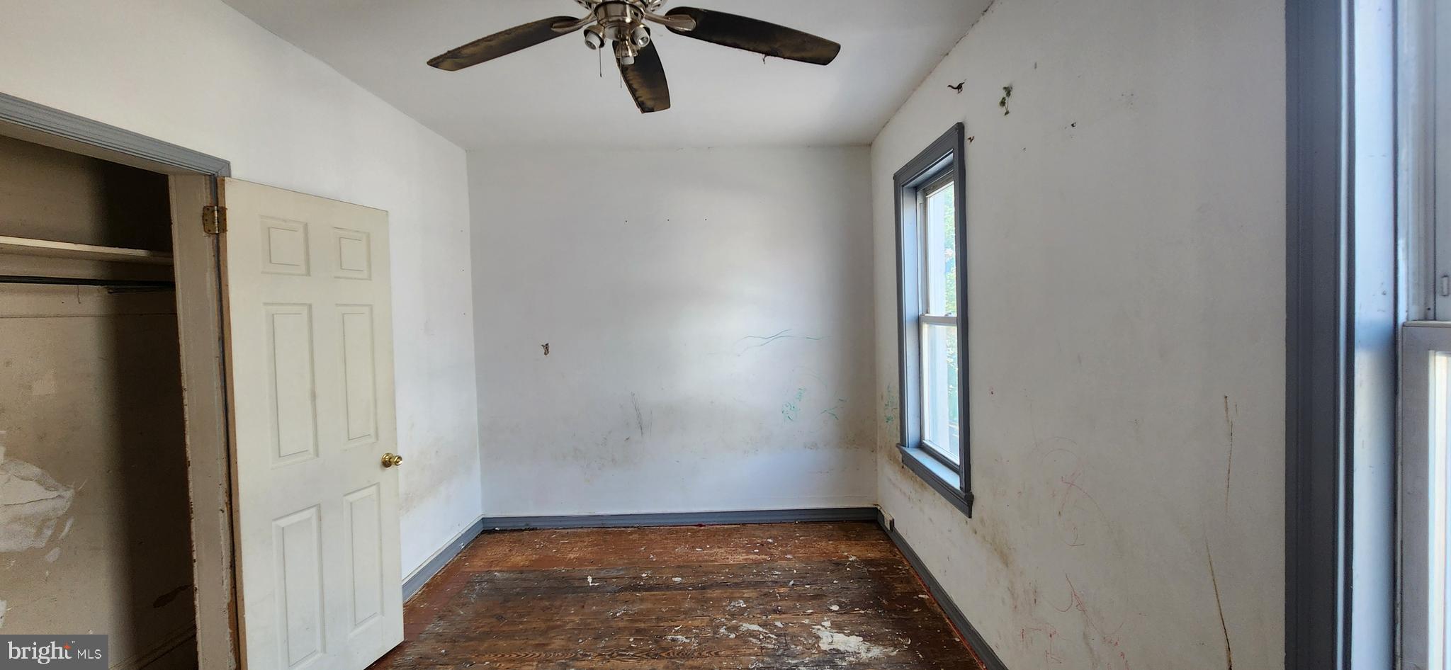 120 West Buttonwood Street Reading, PA 19601 - Photo 17 of 21 a view of hallway with window and a ceiling fan