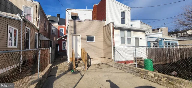 a view of a hallway to a bedroom
