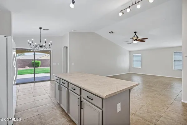 a view of a kitchen with a sink and dishwasher
