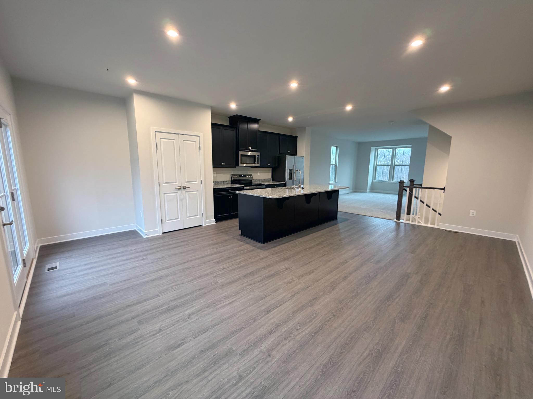 9331 Klamath Court Frederick, MD 21701 - Photo 13 of 28 a view of kitchen with refrigerator stove and wooden floor