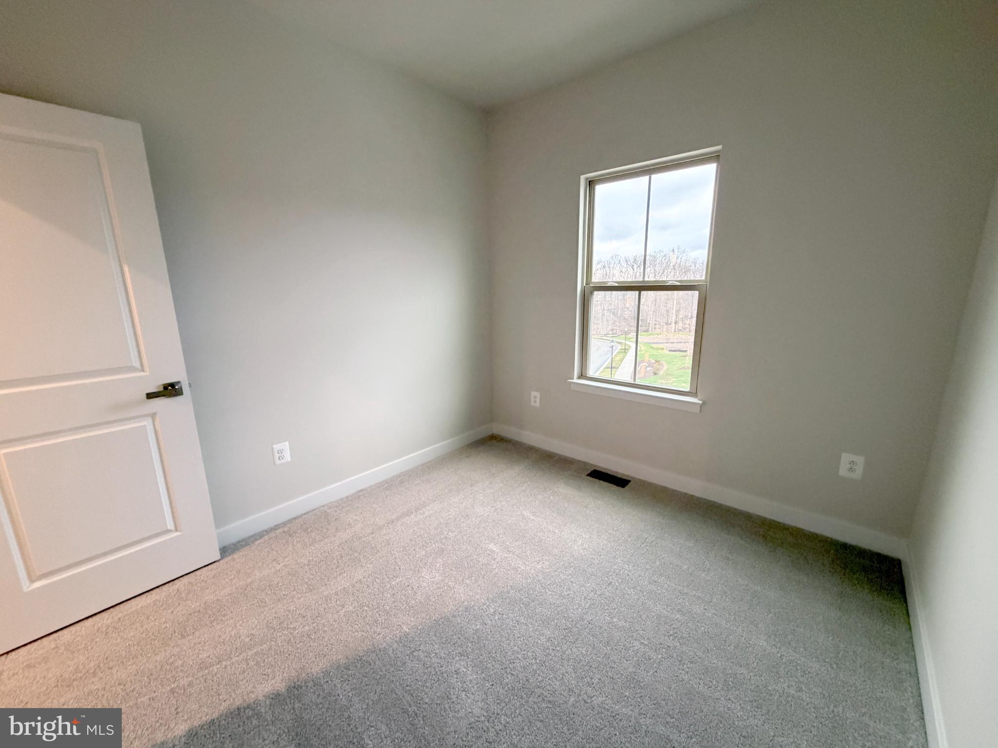 9331 Klamath Court Frederick, MD 21701 - Photo 19 of 28 an empty room with windows