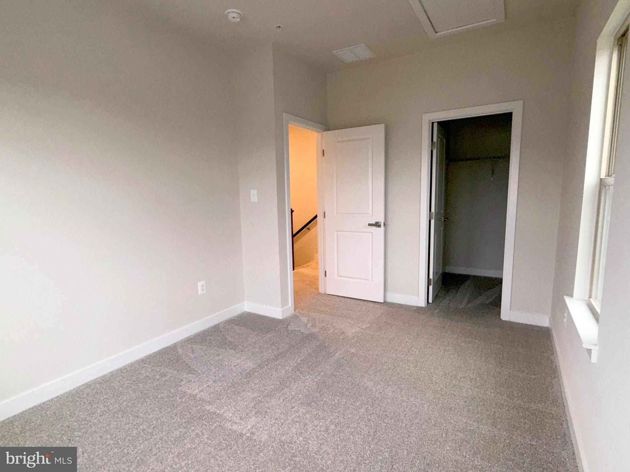 9331 Klamath Court Frederick, MD 21701 - Photo 20 of 28 a view of an empty room with closet and a window