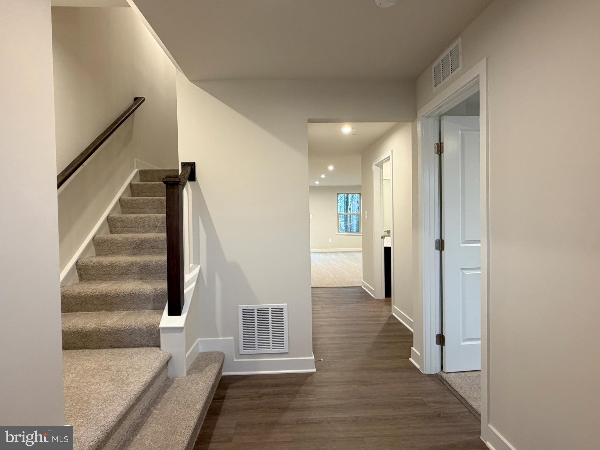 9331 Klamath Court Frederick, MD 21701 - Photo 3 of 28 a view of entryway and hall with wooden floor