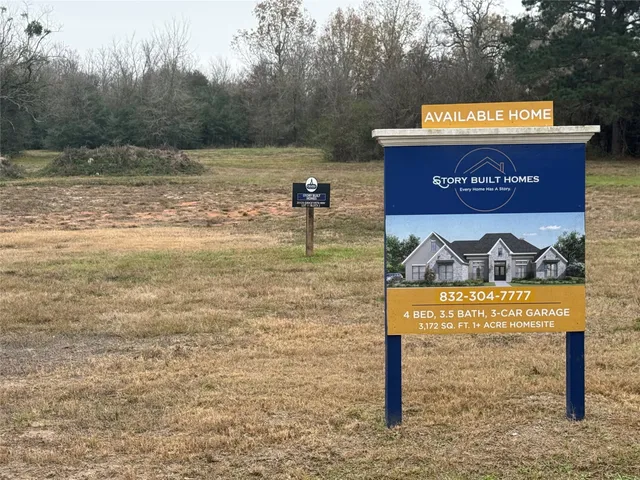 a view of a sign board with a park